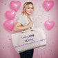 Loving ways of living tote bag, woman with balloons in the background - Sheer: your Luck - Sheerluck-art.com