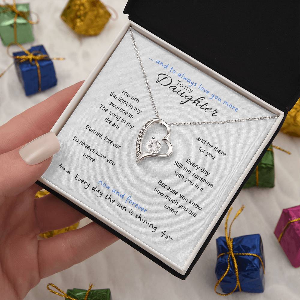 To my daughter with message card and forever love necklace, 14k white gold finish, hand holding it with colored background - Sheer: your Luck - Sheerluck-art.com
