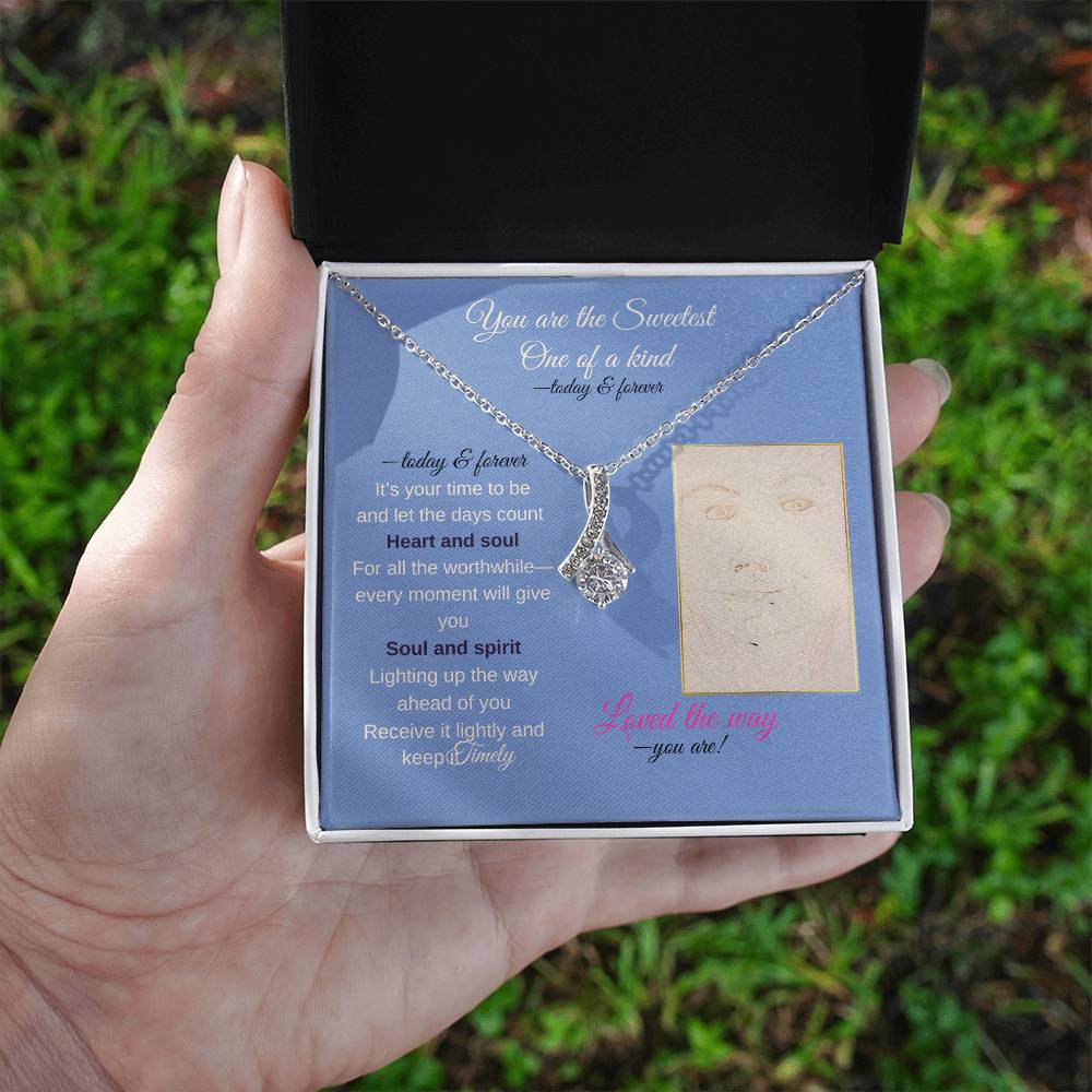 To my daughter message card with alluring beauty necklace (white gold finish), hand holding outdoors - Sheer: your Luck - Sheerluck-art.com